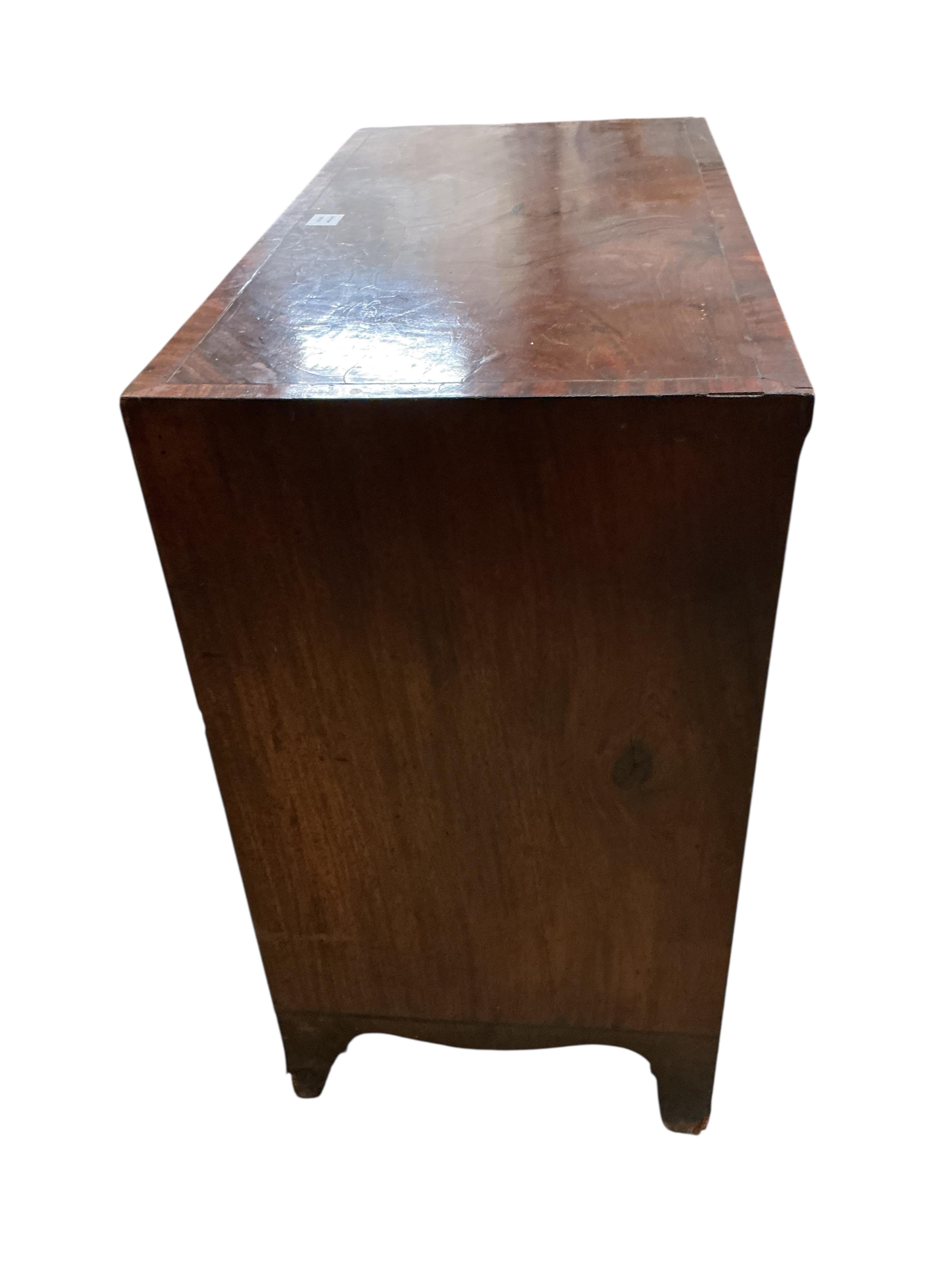 A Regency mahogany straight front chest, fitted four long graduated drawers, under a brushing slide, width 92cm, depth 47cm, height 88cm